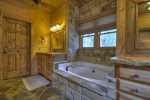Reel Creek Lodge - Private Bathroom w/ Garden Tub and Walk-In Stone Shower